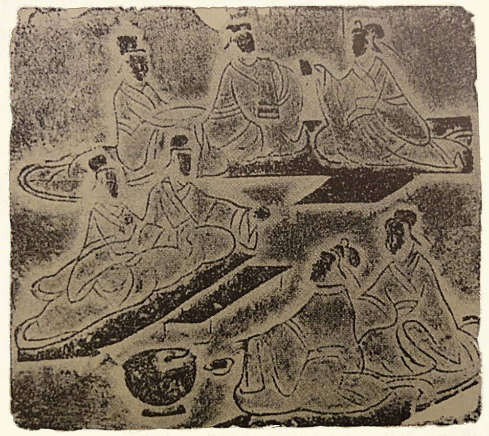 Dining scene from eastern Han brick painting